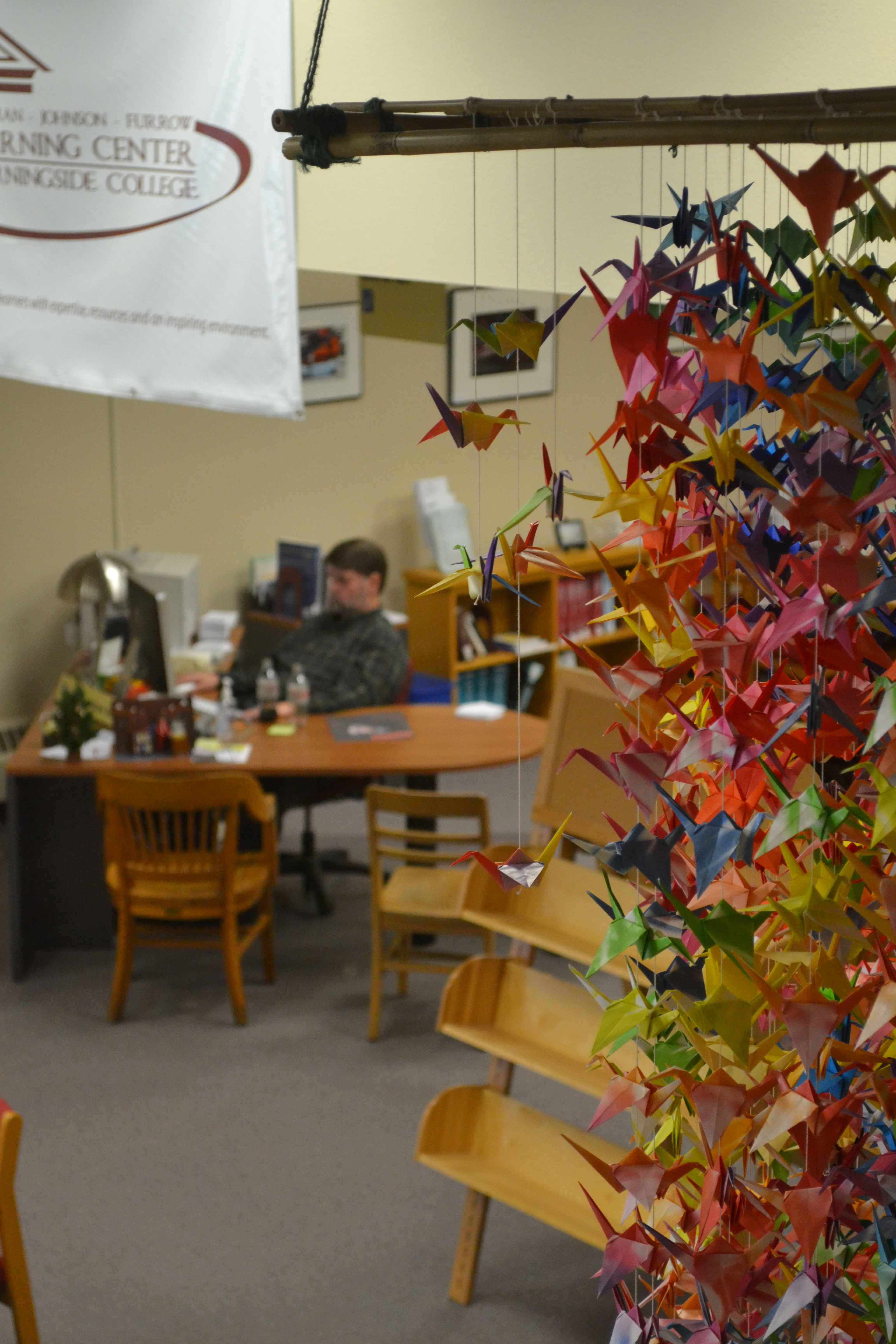 Morningside librarian Jim Fisk works at his desk on Tuesday