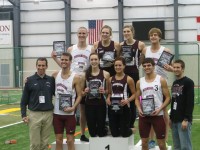 Dave Nash (left) celebrates with both his National Champion 4x800 Meter Teams