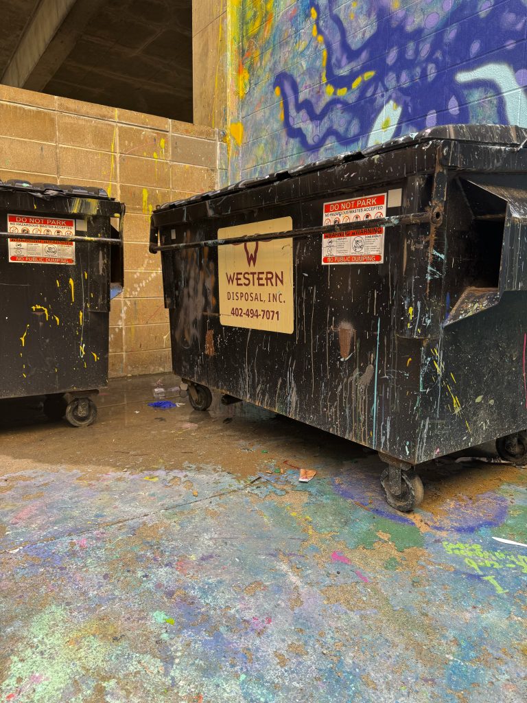 The graffiti art made this trash can unique.